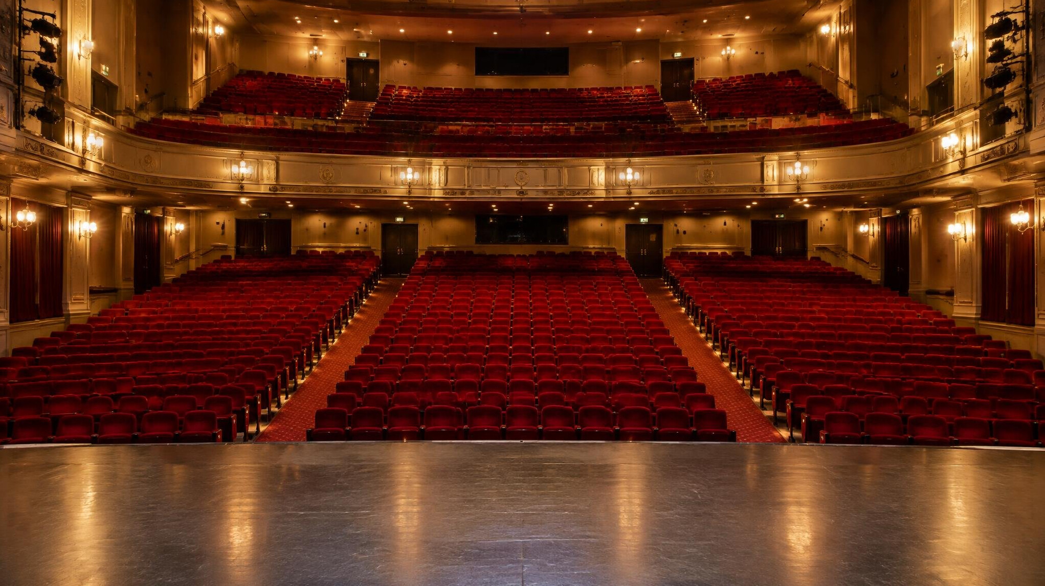 Empty theater auditorium with rows of seats
